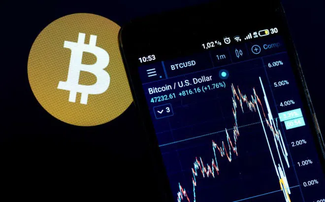 Bitcoin vượt 52.000 USD, đạt mức cao nhất mọi thời đại